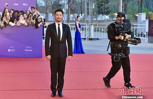 吳京亮相北京電影節(jié)。<a target='_blank'  data-cke-saved-href='http://www.chinanews.com/' href='http://www.chinanews.com/' ><p  align=
